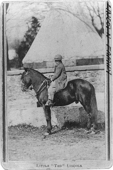 Tad Lincoln on pony between 1860 and 1865